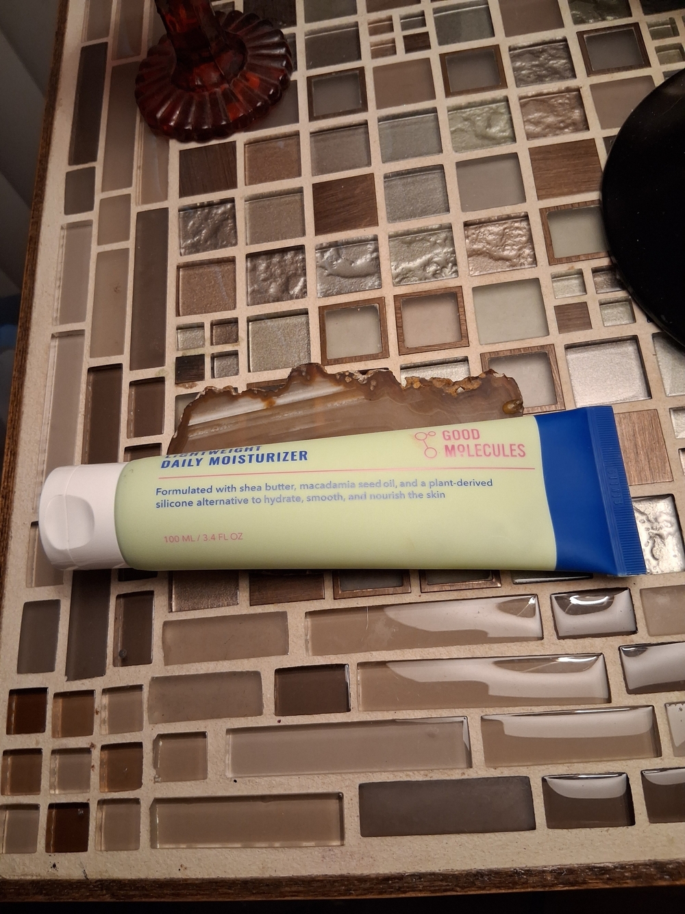 Good Molecules Daily Moisturizer in Light Yellow with Blue Cap
